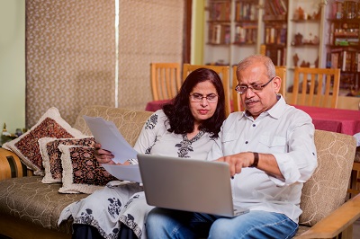 Indian couple doing taxes