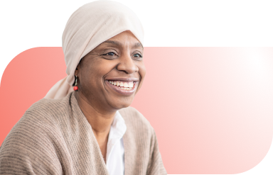 woman with head wrap smiling