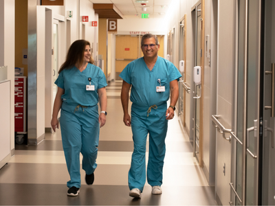 Overlake staff walk in hallway.