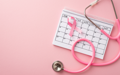Calendar with breast cancer ribbon.