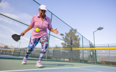 Woman plays pickleball