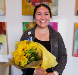 Grace Nguyen, RN, receives Overlake's DAISY of the Year 2022 award.
