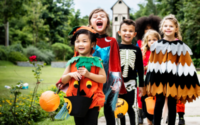 Kids in costume trick-or-treating.