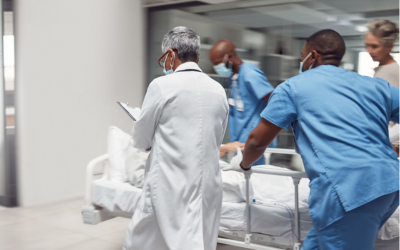 ER staff rush to get patient to surgery.