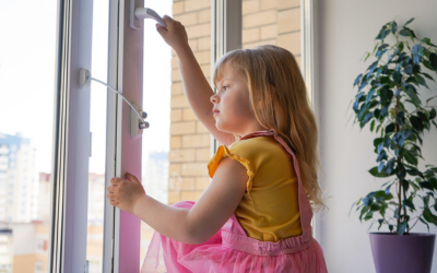 Safety at home for small children. A lock on the window protects children from opening the window. 