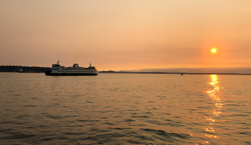 Smoky sky, water landscape with Washington ferry.