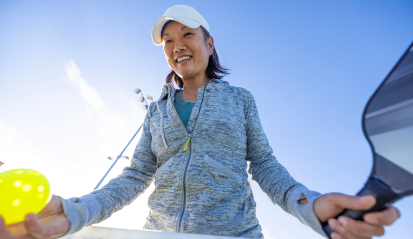 woman on pickleball court