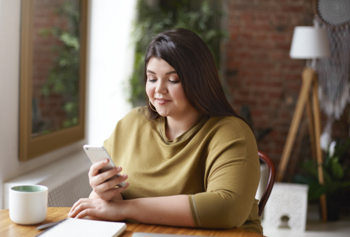 Woman looking at cell phone
