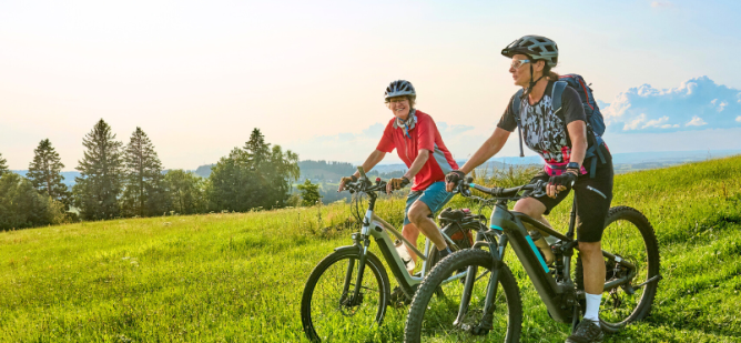 Two older women biking in Washington.