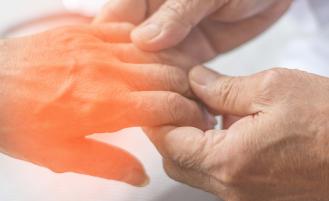 Dr. and patient assisting with assessing nerve pain or damage