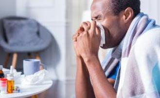 Person blowing their nose