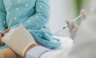 Child receiving a shot