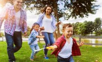 A family playing at a park