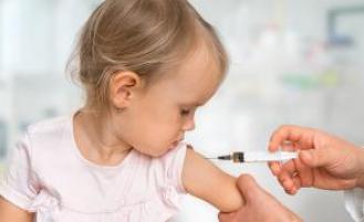 Child receiving a vaccine shot