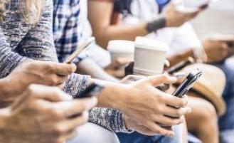 People looking at their smart phones