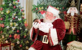 Santa holding an infant