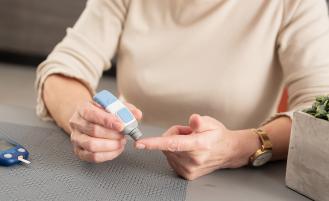 woman-with-diabetes-checking-blood-sugar