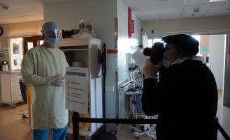 Dr. James Copeland, Critical Care, shows what equipment he uses to enter COVID-19 isolation rooms.