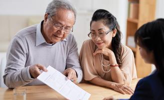couple-reviewing-paperwork