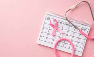 Calendar with breast cancer ribbon.