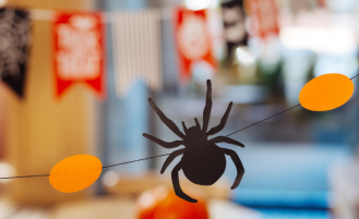 Paper cut out decoration of spider for Halloween.