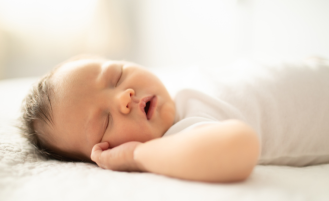 Baby sleeping on back