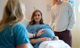 Pregnant woman consults nurse at Overlake.