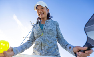 woman on pickleball court