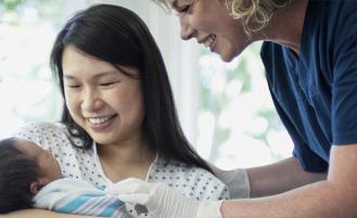 Parents holding newborn